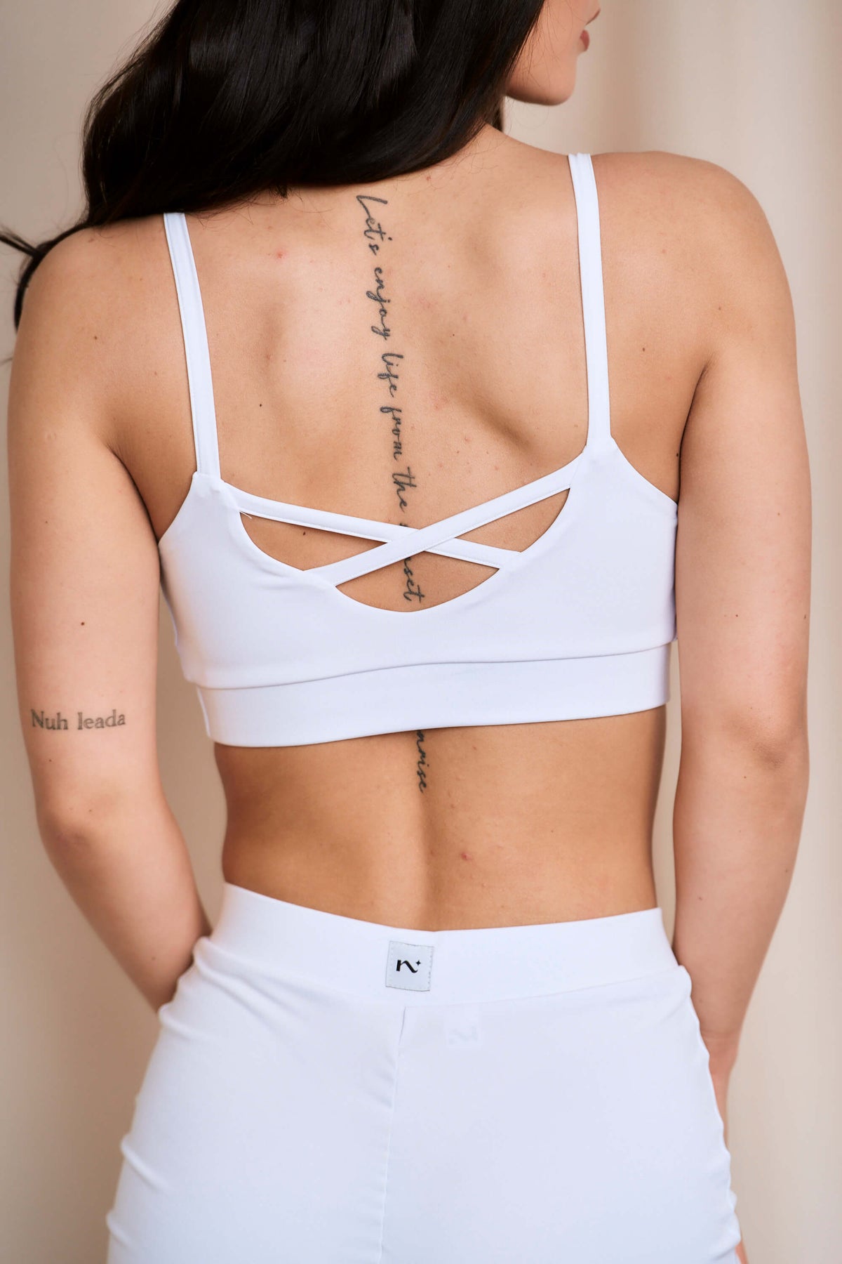 Delia white sports bra